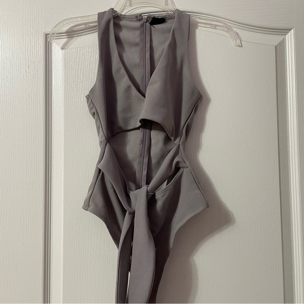 Grey thong bodysuit with tie detail and zipper in back